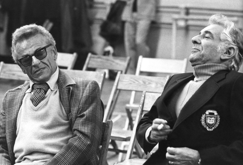 Alan Jay Lerner and Leonard Bernstein in conversation at rehearsal.