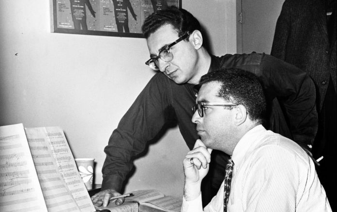 Sheldon Harnick and Jerry Bock work at the piano.